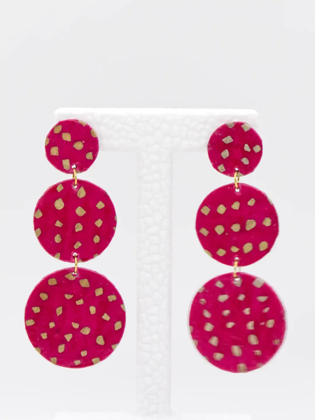 Pink triple-disc earrings with gold polka dots