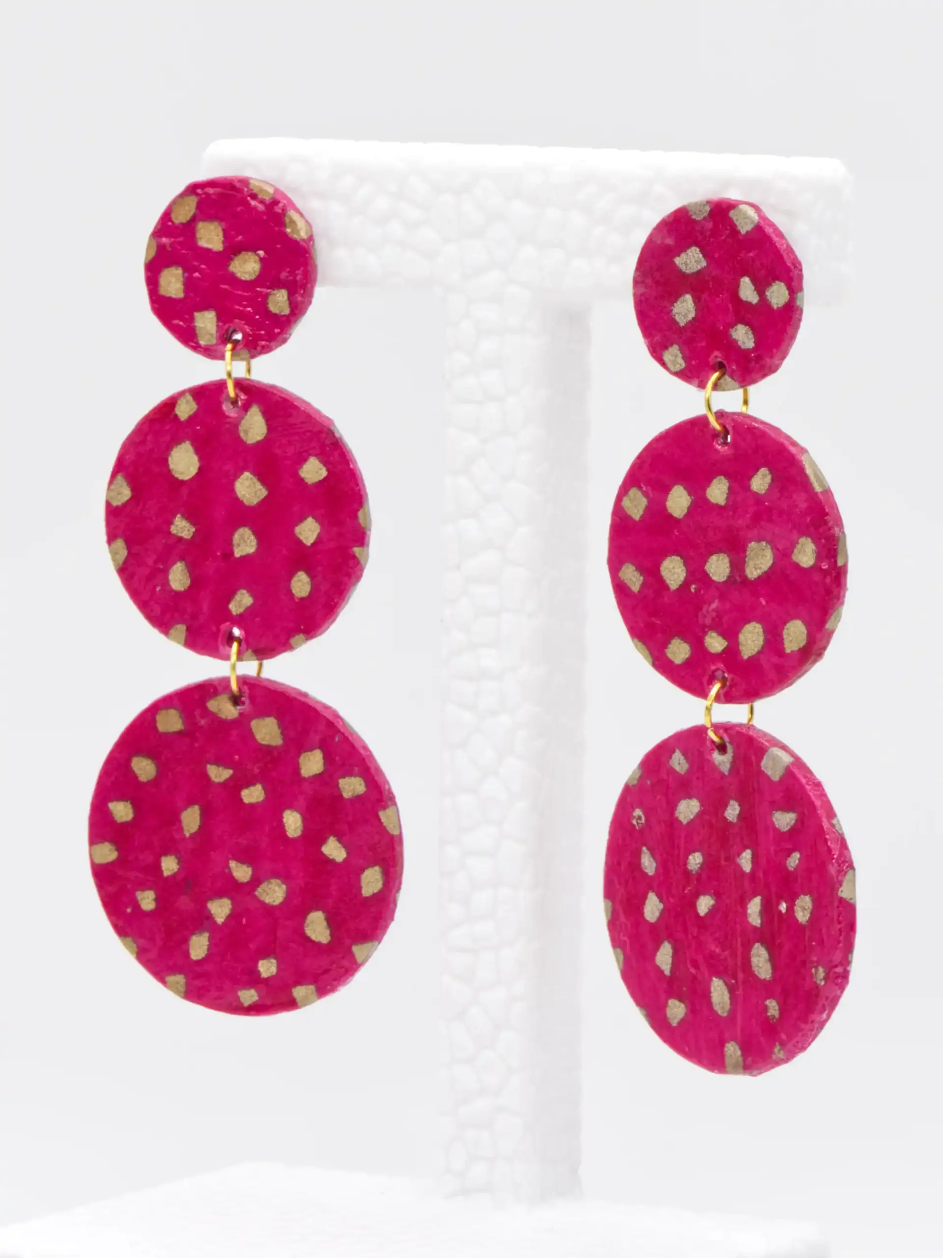 Pink triple-disc earrings with gold speckles
