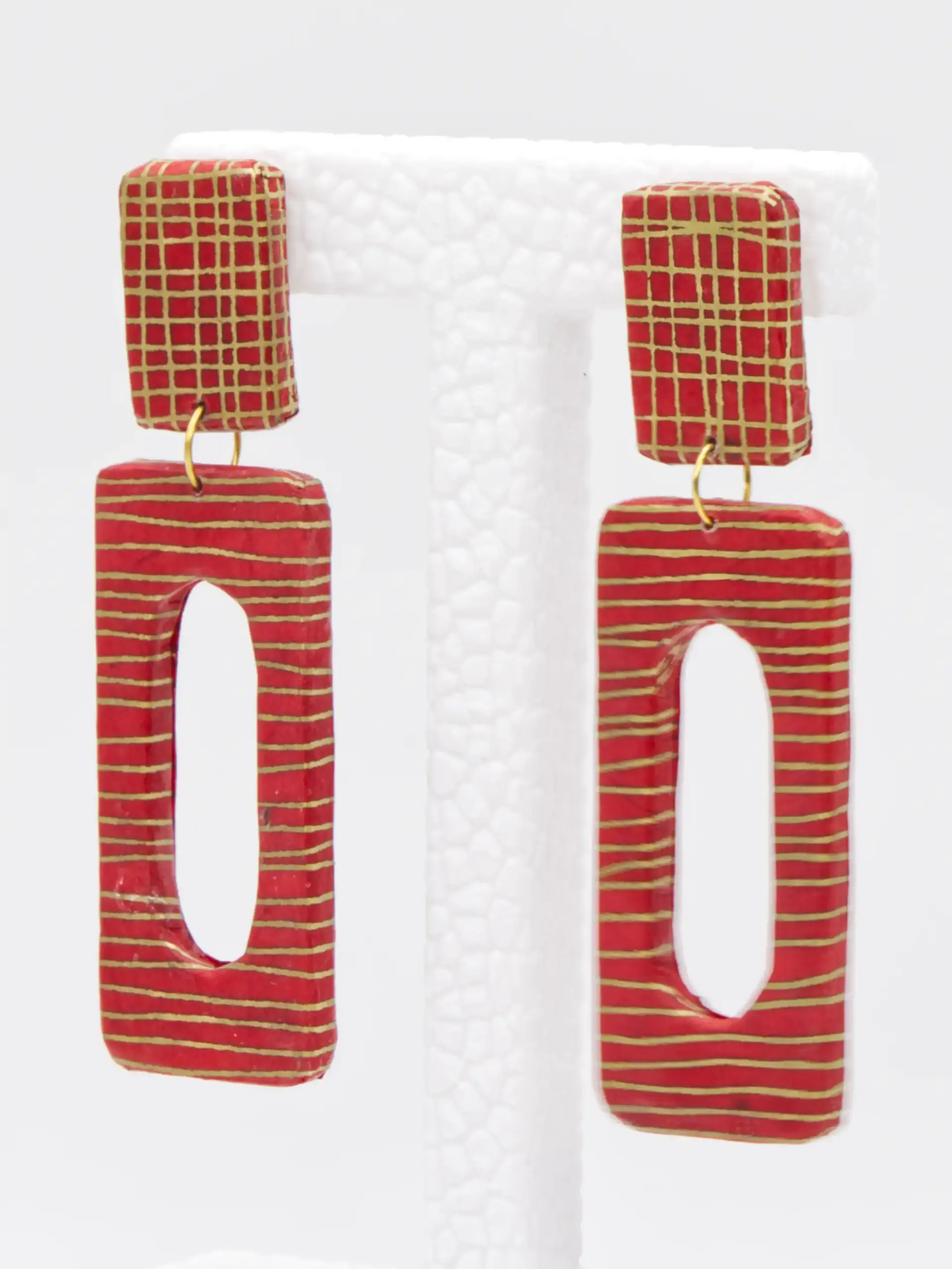 Red and gold patterned geometric dangle earrings