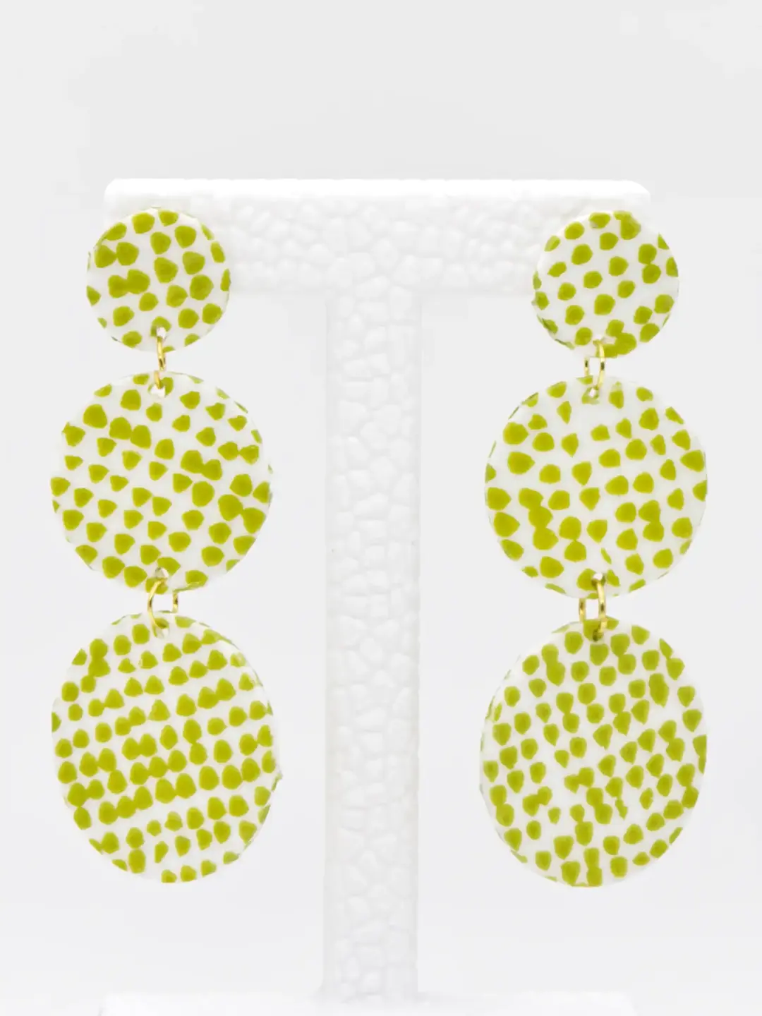 Green speckled three-tier dangling earrings with gold links