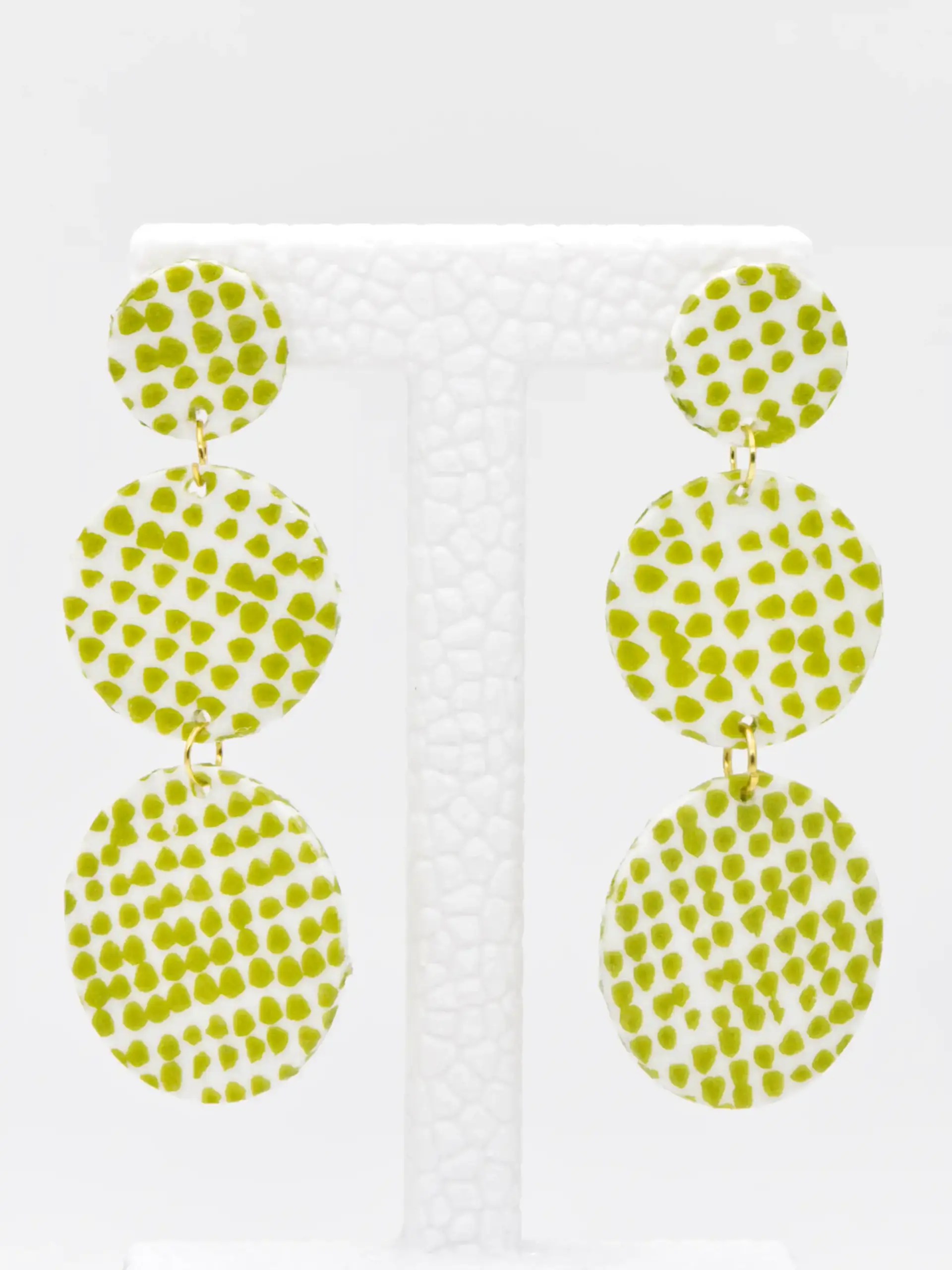 Green speckled three-tier dangling earrings with gold links