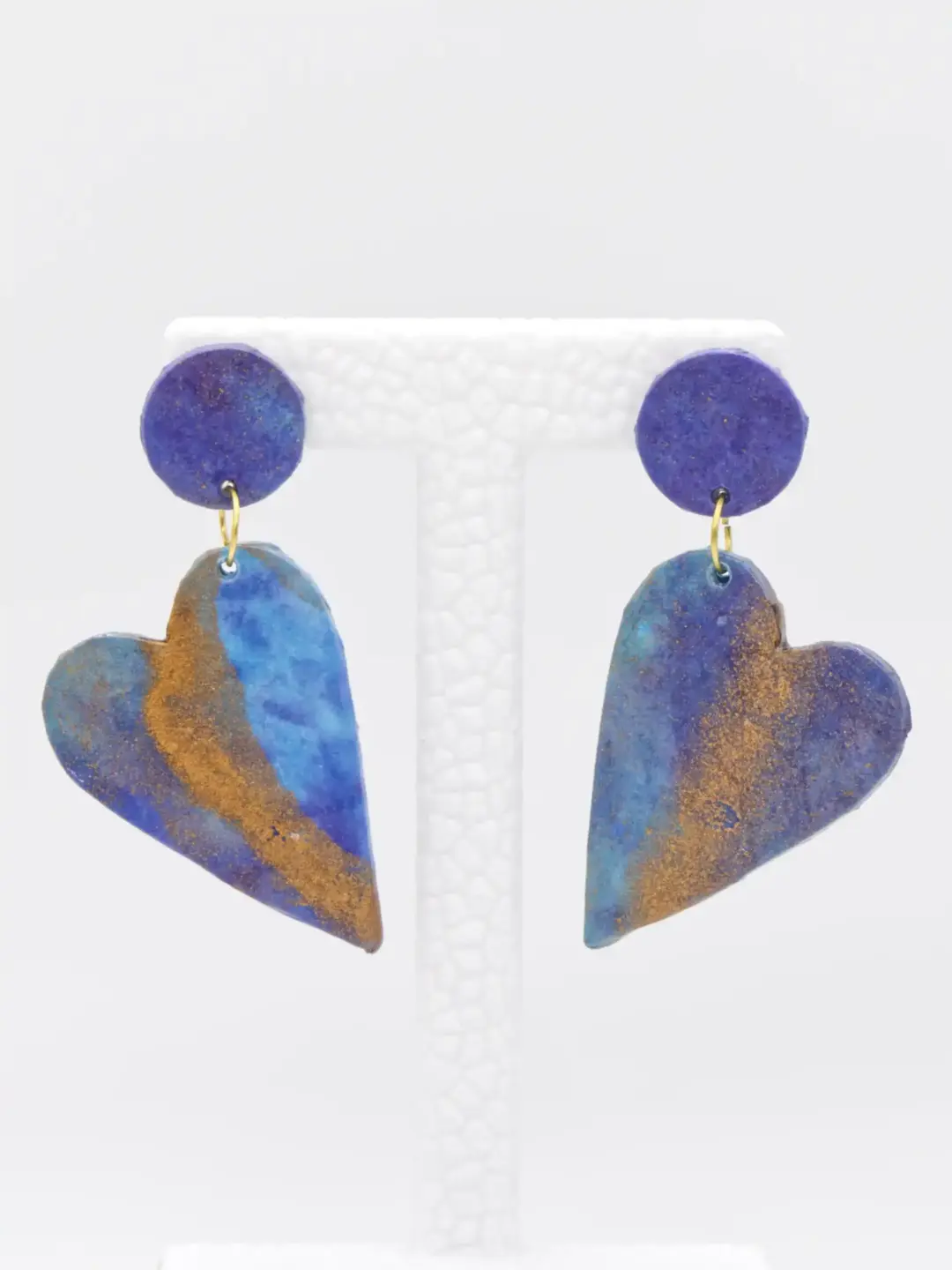 Blue and gold heart-shaped dangling earrings