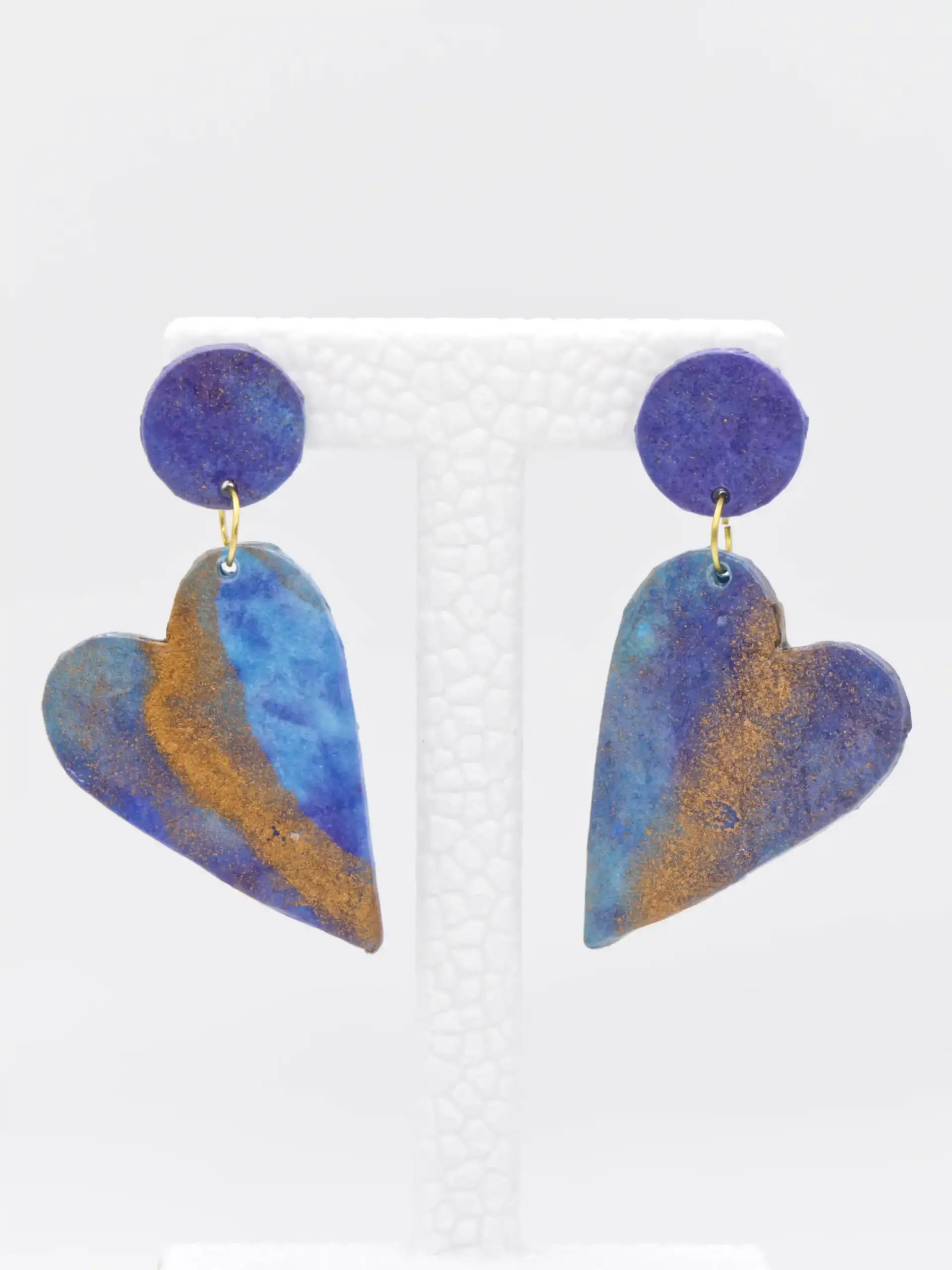 Blue and gold heart-shaped dangling earrings