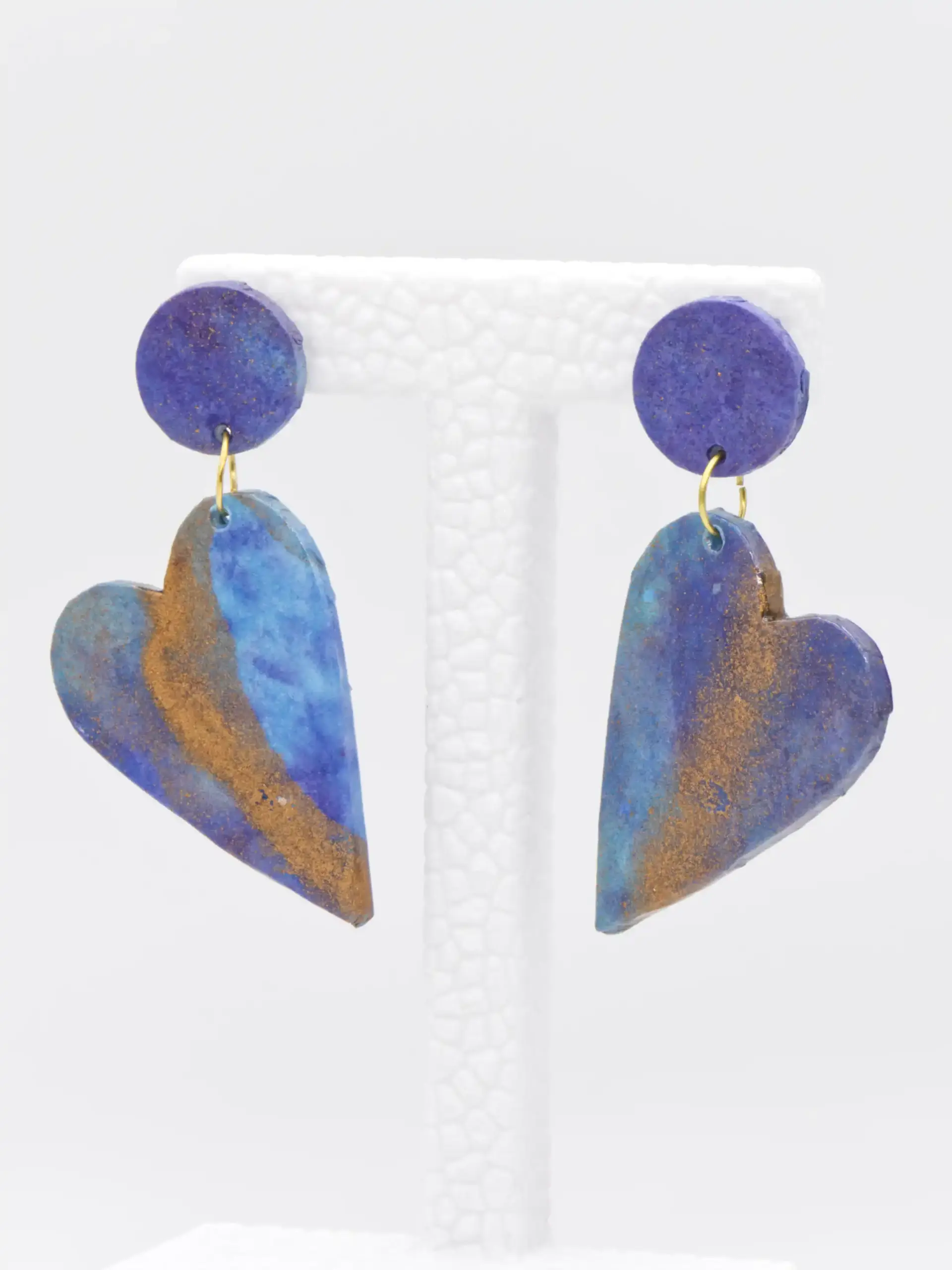 Blue and gold heart-shaped dangling earrings