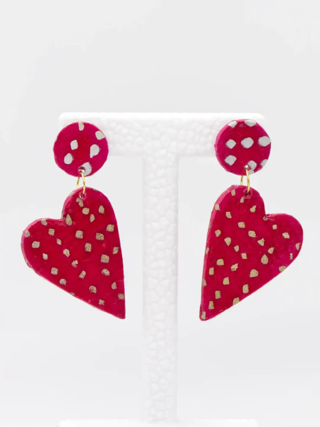 Red heart drop earrings with gold polka dots